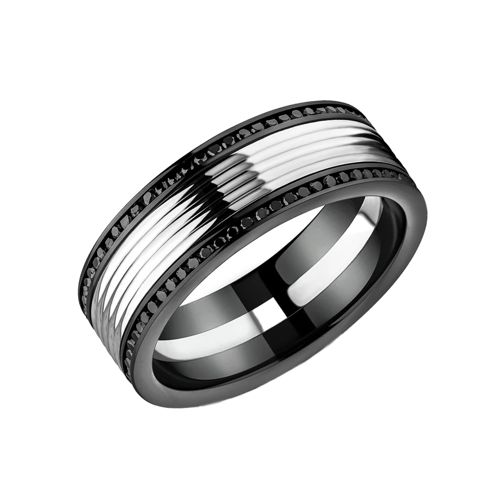 Silver and black ring with textured design and diamonds on a white background