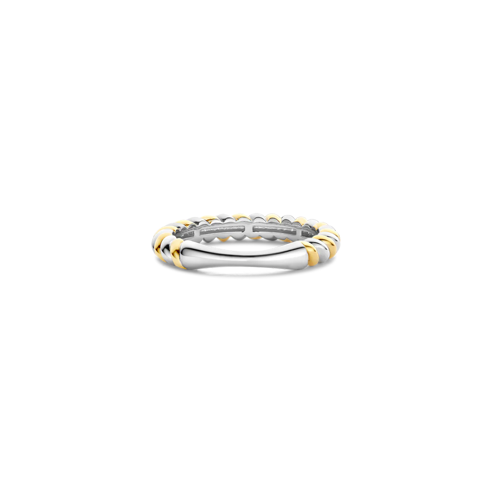 Two-toned ring with gold and silver colors on a white background