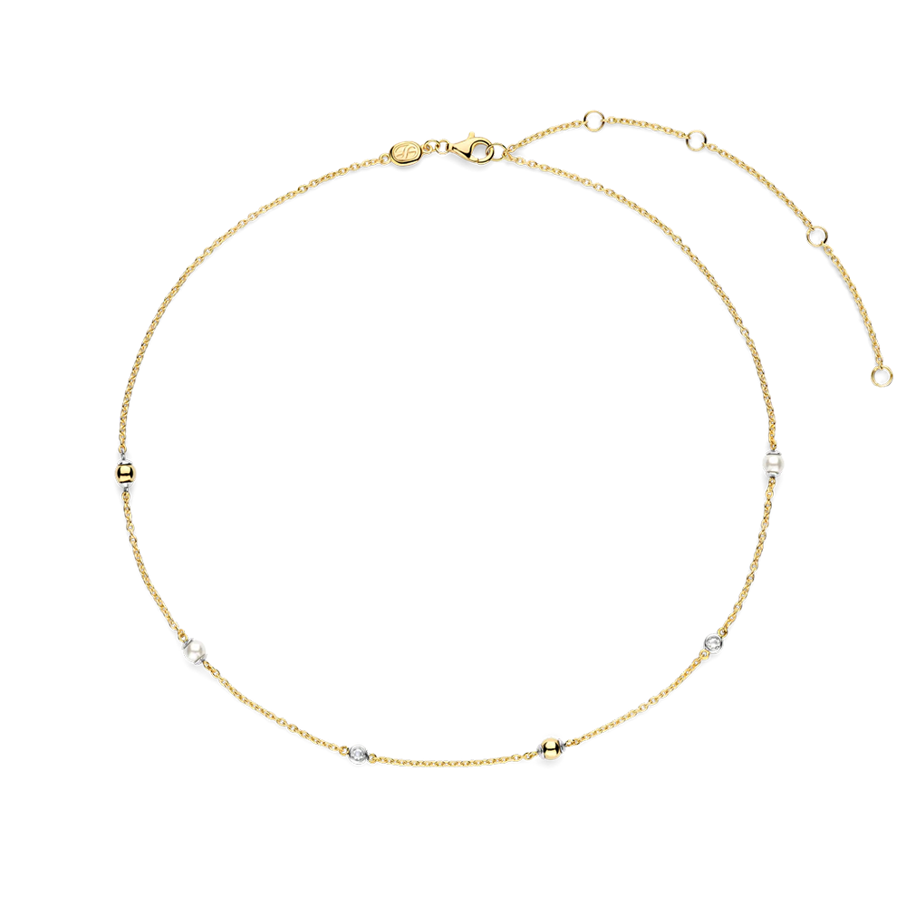 Gold necklace with small beads on a white background