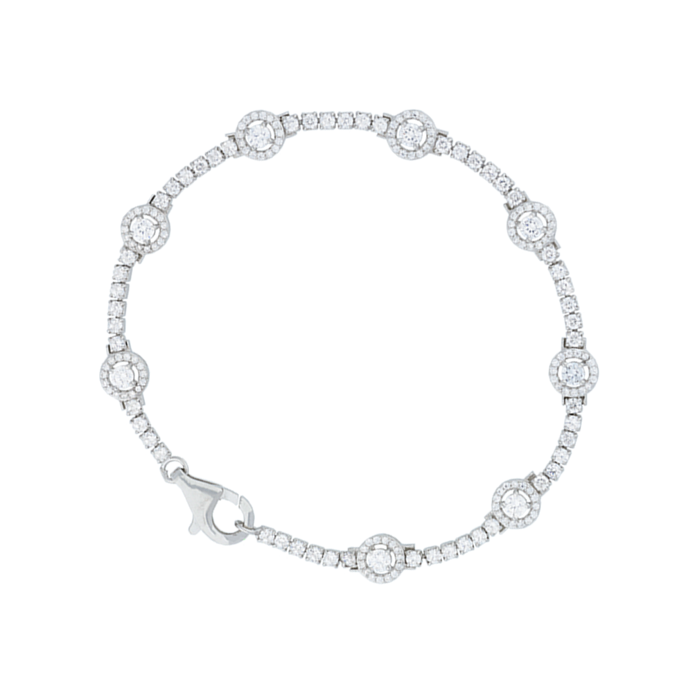 Silver bracelet with clear stones on a white background