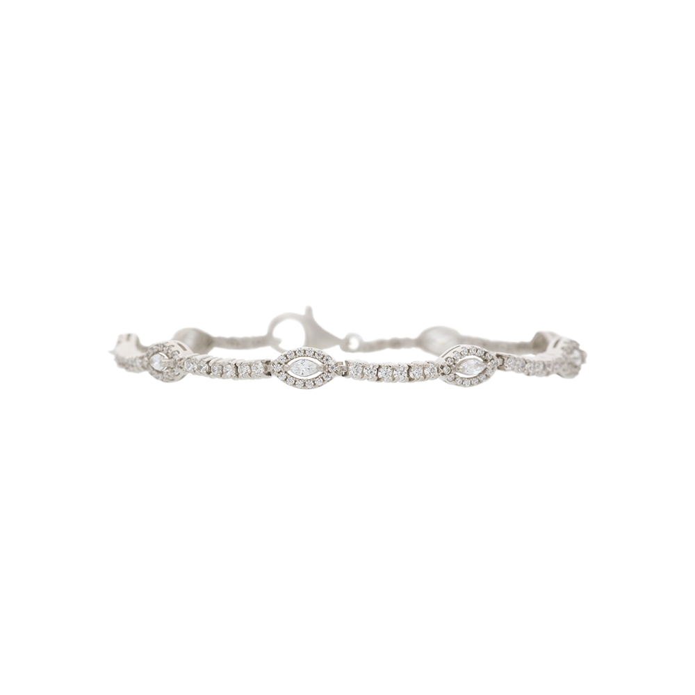 Silver bracelet with small stones on a white background