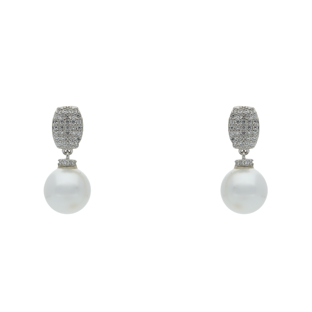 Pair of earrings with pearl drops and silver tops on a white background
