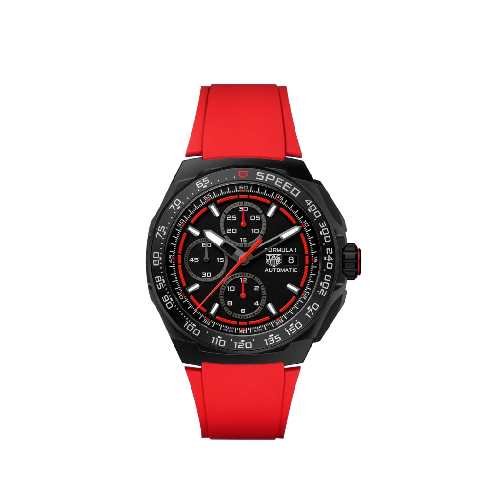 Watch with red strap and black dial on a white background