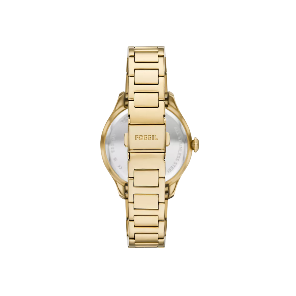 Gold Fossil watch on a white background