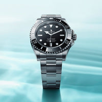 files/rolex-collection_banner-submariner-m124060-0001-0002_2210jva_001-portrait.jpg