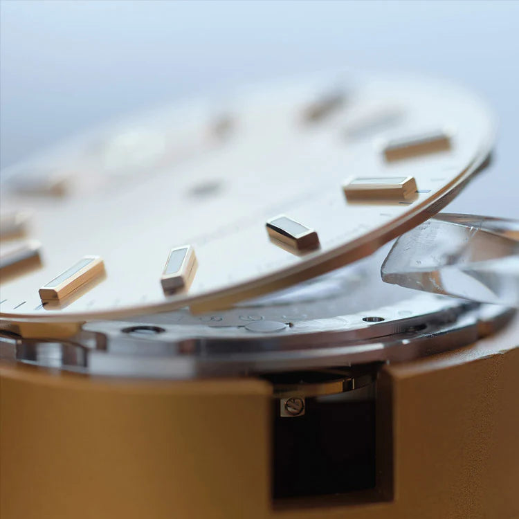 A close up of the dial of a Rolex watch